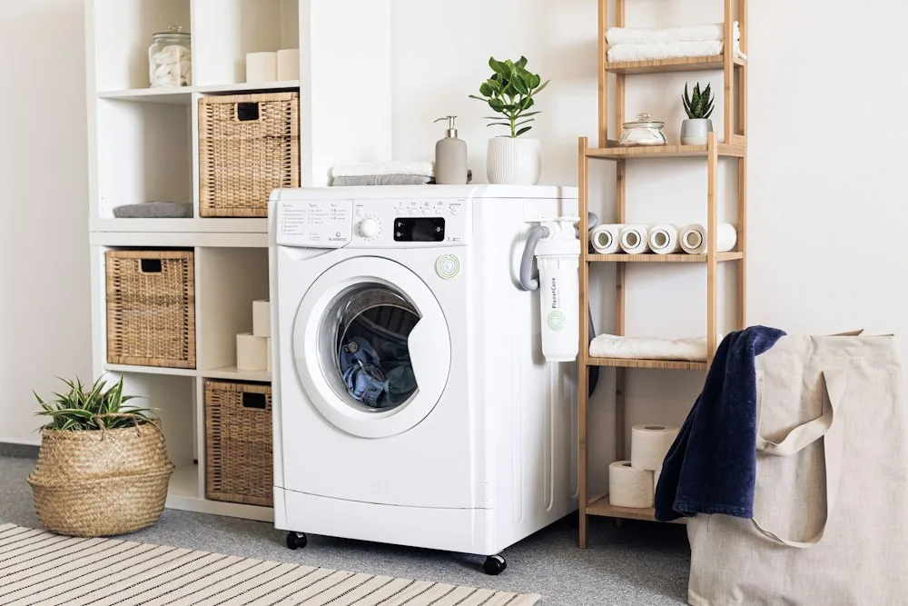 Appliance technician working on a modern laundry dryer